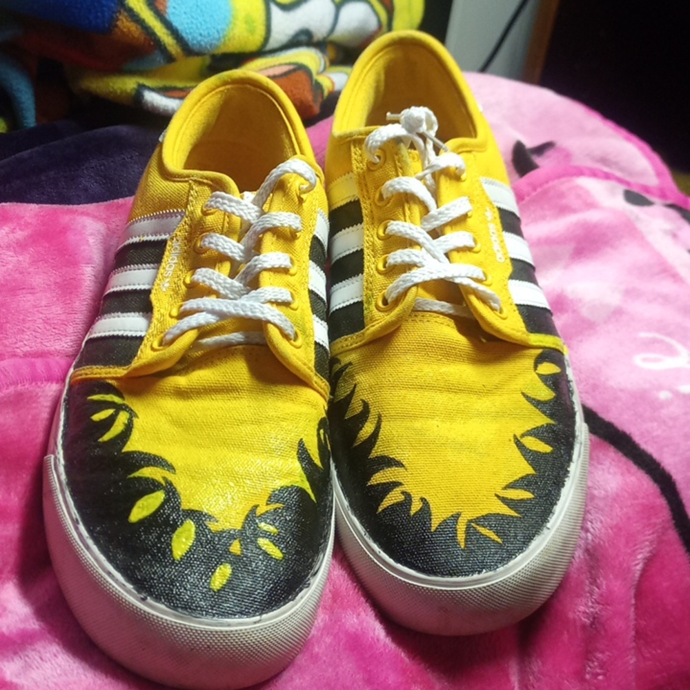 Custom painted back and yellow Adidas shoes
